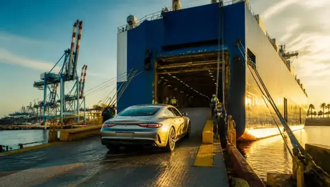 Car being driven onto a roll-on/roll-off ocean vessel at a West Coast port for shipment to Hawaii